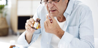 Elderly Patients Who Stop Antipsychotics Have Better Outcomes An elderly man takes a pill