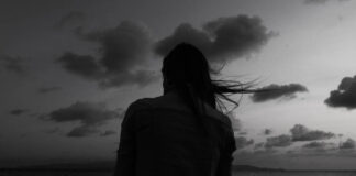 Where Is God When I Cut Myself? Soul Care and the Voices of Self-Injury Survivors Alone woman at the beach one twilight time looking out to sea