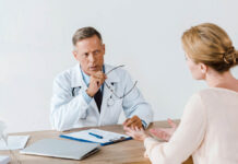 Doctor explaining something to patient