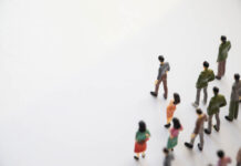 Miniature shot. People crowded in the lower right corner, walking
