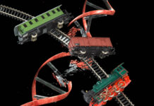 Illustration of a wrecked train on tracks. Behind it, a DNA helix is dissolving in red light