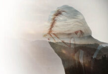 Double exposure; sad woman with forest in background