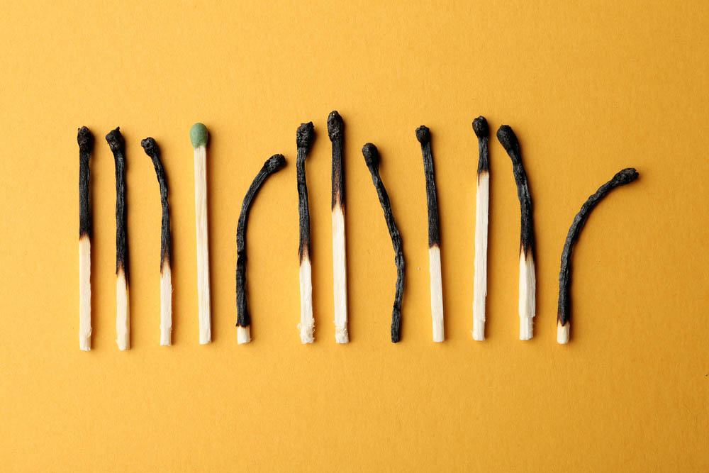 burnt matches in a line