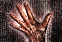 A glowing hand against a dark background