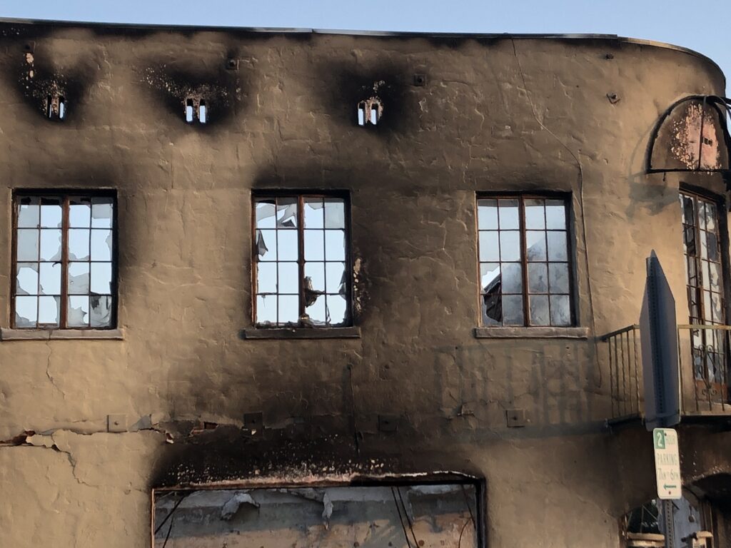 a photo of the burnt facade of a building