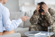 Farewell to Suicide psychologist having conversation with depressed soldier