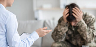 Farewell to Suicide psychologist having conversation with depressed soldier