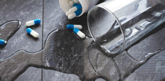 Antidepressants Are Major Drivers of Suicides Water is spilled and medical capsules are scattered
